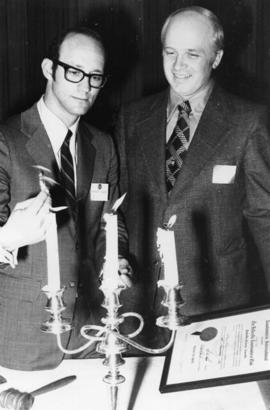 Two men from the Belleville Coastmasters Club, in Belleville, Ontario.