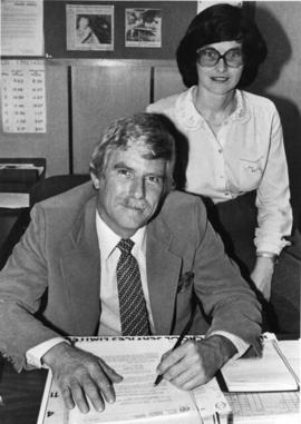 Wally Moffat, principal of Centennial Secondary school, with Yvonne Herrington after being presen...