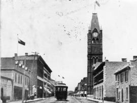 Front Street with street car, City Hall on right