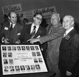 Former president of the Sales and Advertising Club Bill Riley and others in Belleville, Ontario.